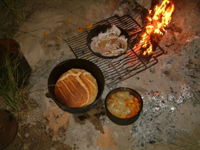 Have bush tucker like this? Camp oven bread, fish just off the hook, vegies and potatoes in the coals. 